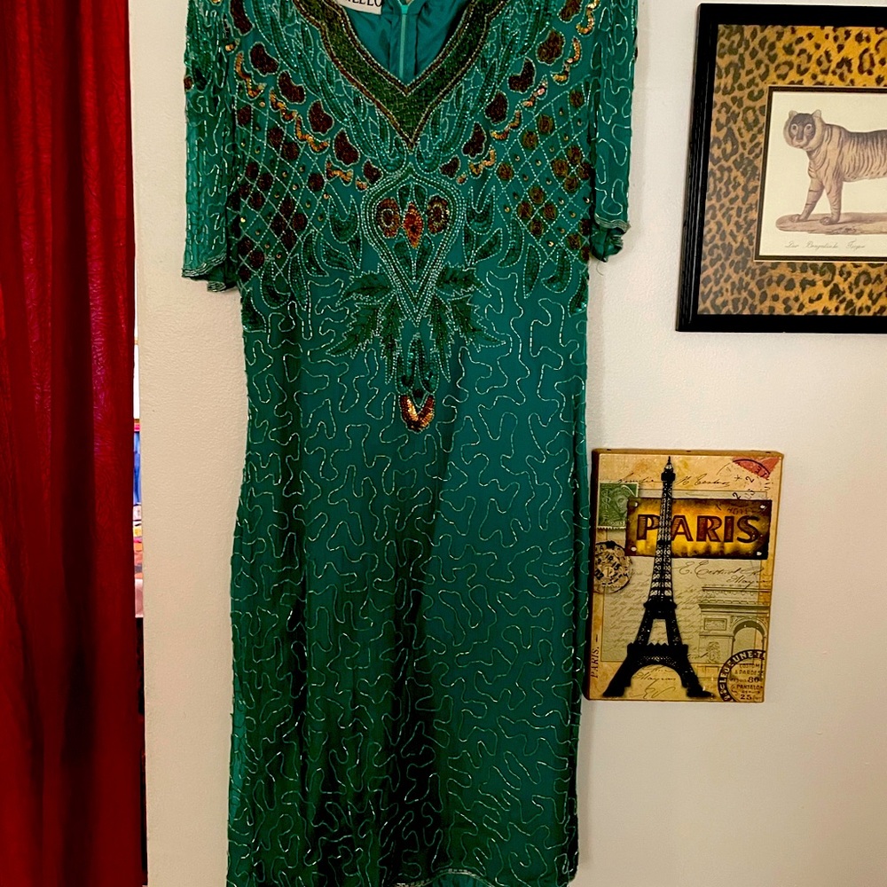Hand embroidered cocktail dress. No dry cleaning, pro spot clean. Never worn!